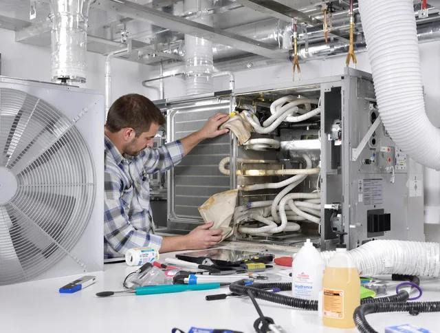 Bristol Air Duct Cleaning specialist performing precision AC coil cleaning in Bristol