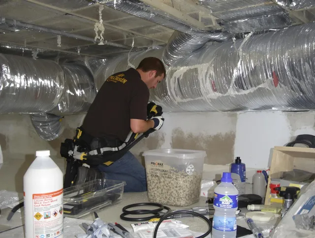 Bristol Air Duct Cleaning specialist performing professional mold removal from air ducts in Bristol