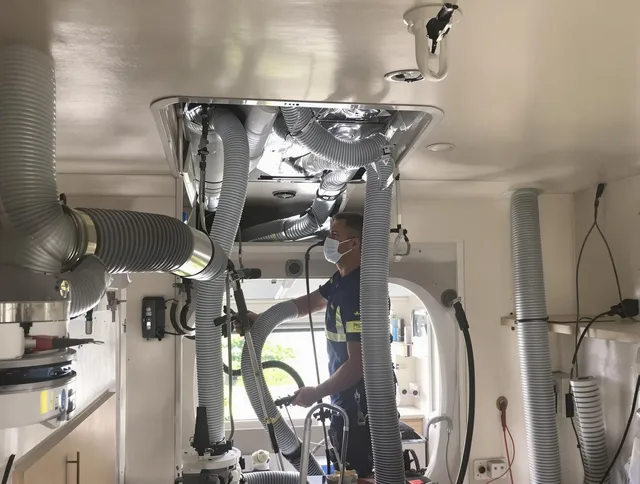 Bristol Air Duct Cleaning specialist performing precise mobile home duct cleaning in Bristol